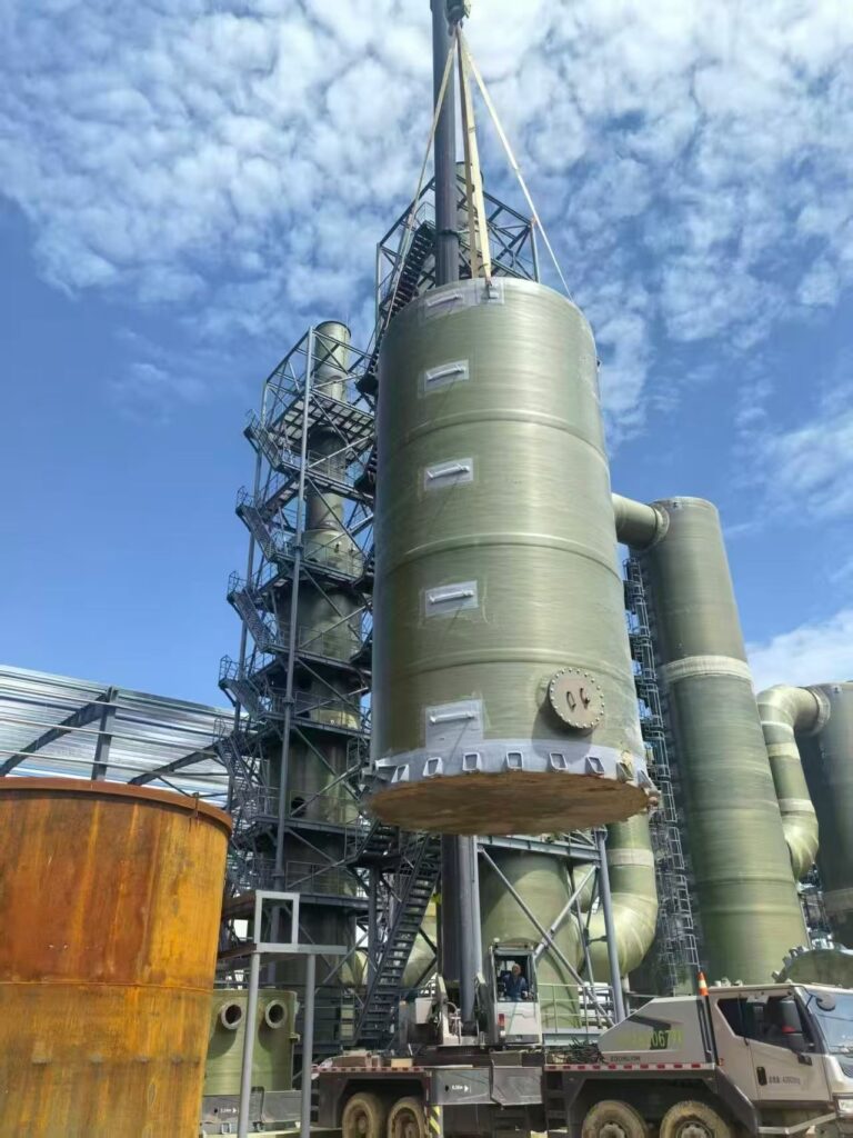 FRP tank installation at industrial plant